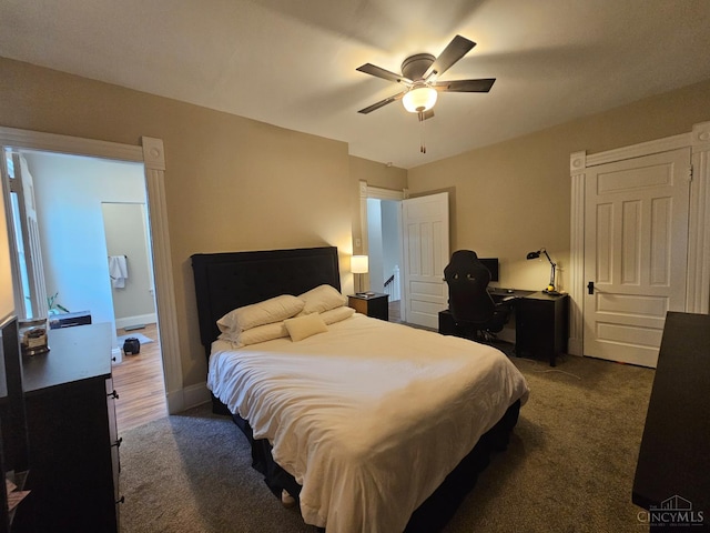 2002 Clarion Ave, Cincinnati, OH 45207 - bedroom featuring dark carpet, an office area, and a ceiling fan