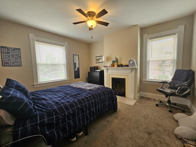 2002 Clarion Ave, Cincinnati, OH 45207 - bedroom featuring carpet, a fireplace with flush hearth, and a ceiling fan