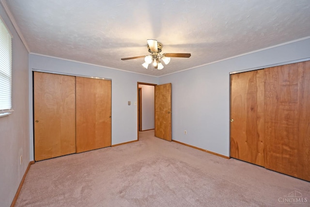 9660 N Dixie Hwy, Franklin Twp, OH 45005 - unfurnished bedroom with baseboards, carpet flooring, crown molding, and ceiling fan