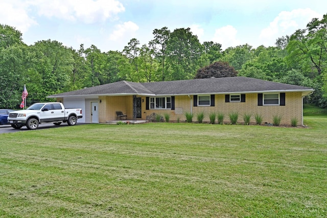 9660 N Dixie Hwy, Franklin Twp, OH 45005 - ranch-style home with an attached garage, a front lawn, and brick siding