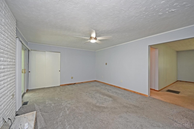 9660 N Dixie Hwy, Franklin Twp, OH 45005 - unfurnished bedroom with carpet floors, baseboards, a ceiling fan, a textured ceiling, and ornamental molding