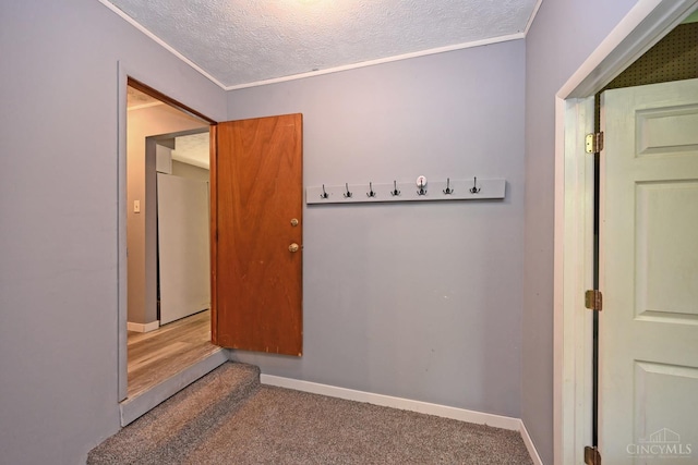 9660 N Dixie Hwy, Franklin Twp, OH 45005 - corridor featuring carpet floors, a textured ceiling, crown molding, and baseboards