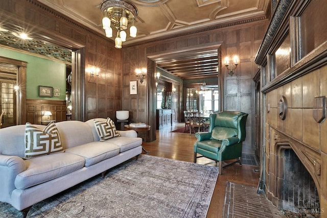 2334 Upland Pl, Cincinnati, OH 45206 - living area with crown molding, wooden walls, and wood finished floors