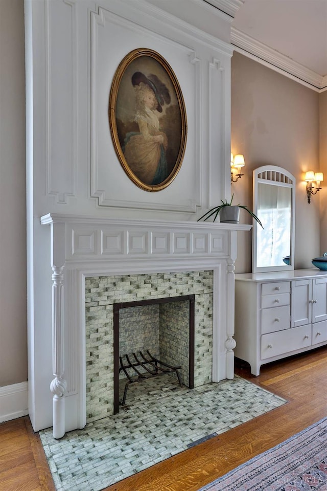 2334 Upland Pl, Cincinnati, OH 45206 - detailed view of ornamental molding, a tiled fireplace, and wood finished floors