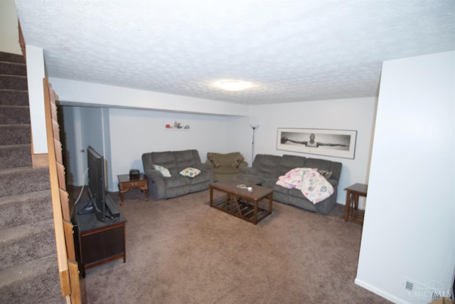 4840 Shannon Way, Middletown, OH 45042 - carpeted living room with stairway and a textured ceiling