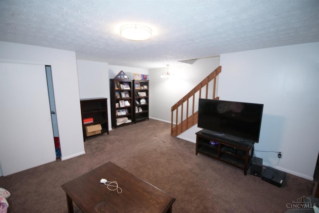4840 Shannon Way, Middletown, OH 45042 - carpeted living room featuring a textured ceiling, stairway, and a chandelier