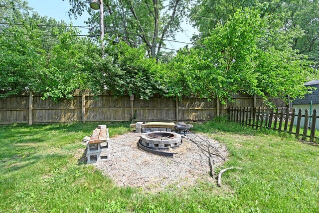2868 Grosvenor Dr, Colerain Twp, OH 45251 - view of yard with an outdoor fire pit