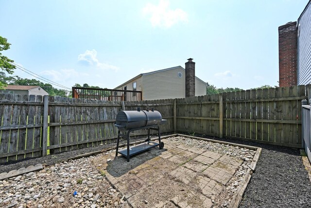 2868 Grosvenor Dr, Colerain Twp, OH 45251 - fenced backyard featuring area for grilling and a patio