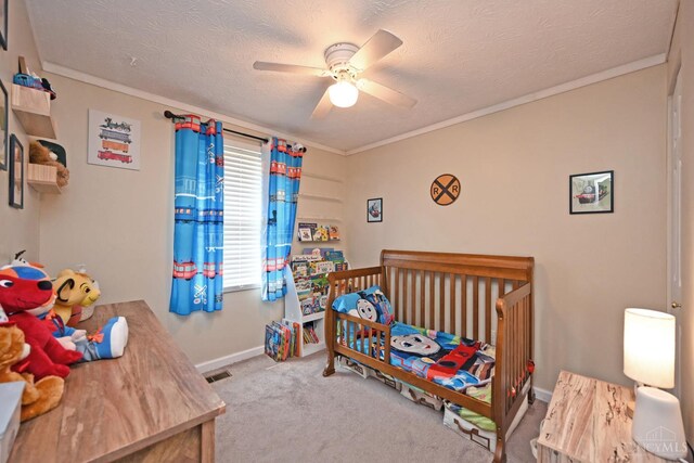 2868 Grosvenor Dr, Colerain Twp, OH 45251 - bedroom featuring carpet, baseboards, a ceiling fan, ornamental molding, and a textured ceiling