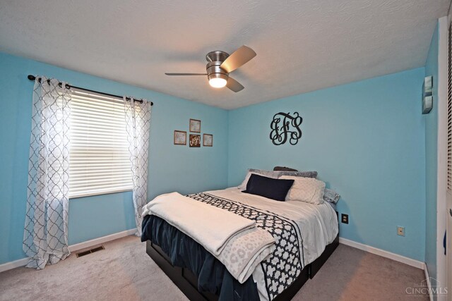 2868 Grosvenor Dr, Colerain Twp, OH 45251 - carpeted bedroom with baseboards and ceiling fan