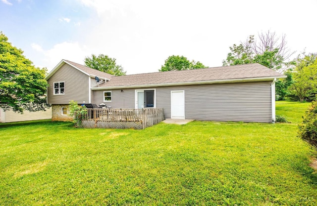 55 Kastrup Dr, Lakengren, OH 45320 - rear view of property with a wooden deck and a yard