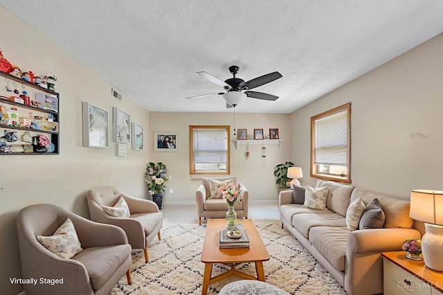 55 Kastrup Dr, Lakengren, OH 45320 - living room with ceiling fan and plenty of natural light