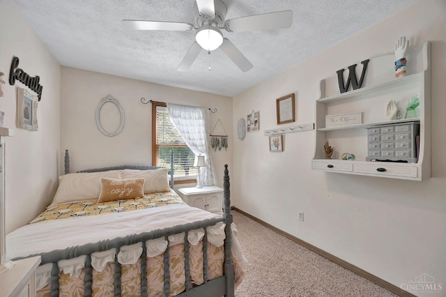 55 Kastrup Dr, Lakengren, OH 45320 - bedroom featuring carpet flooring, a textured ceiling, ceiling fan, and baseboards
