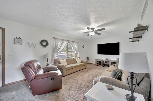 55 Kastrup Dr, Lakengren, OH 45320 - living area featuring carpet floors, ceiling fan, a textured ceiling, and baseboards