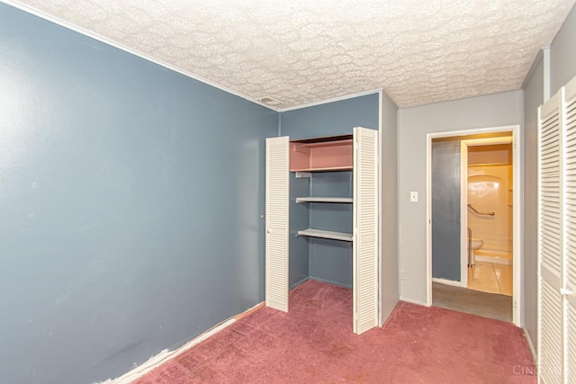 800 Richardson Dr, Middletown, OH 45042 - unfurnished bedroom featuring carpet, a textured ceiling, and baseboards