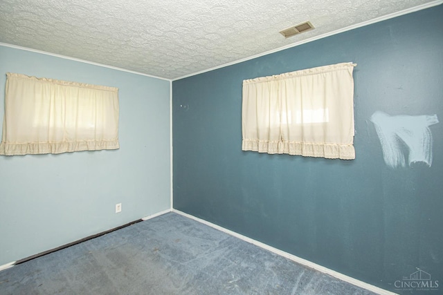 800 Richardson Dr, Middletown, OH 45042 - carpeted empty room with ornamental molding, a textured ceiling, and baseboards