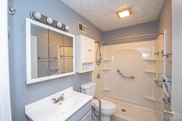 800 Richardson Dr, Middletown, OH 45042 - full bath with toilet, a shower, vanity, and a textured ceiling