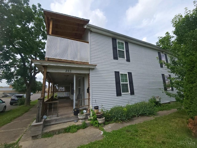223 Park St, Middletown, OH 45044 - rear view of house with covered porch