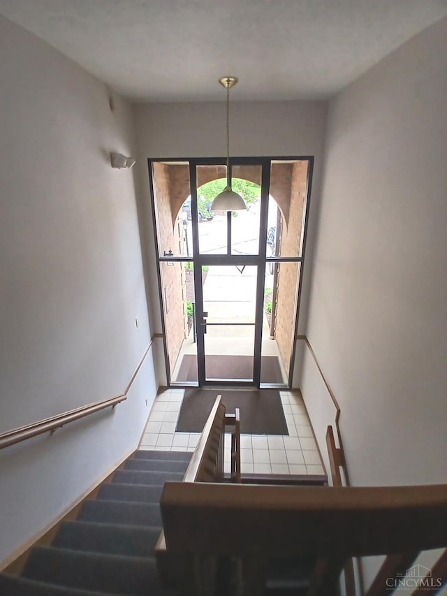 5292 Eaglesnest Dr Unit 41, Green Twp, OH 45248 - stairs featuring tile patterned flooring