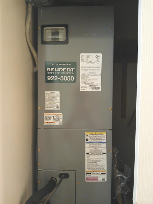 5292 Eaglesnest Dr Unit 41, Green Twp, OH 45248 - utility room with heating unit