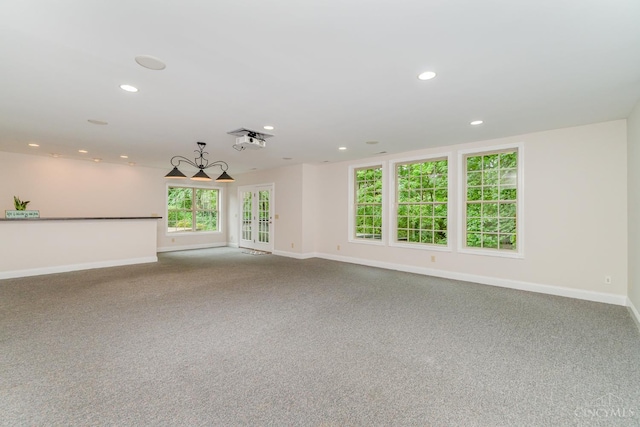 3190 Fox Run Dr, Ross Twp, OH 45013 - carpeted empty room featuring plenty of natural light, recessed lighting, and a chandelier