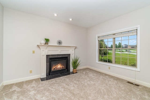 3190 Fox Run Dr, Ross Twp, OH 45013 - unfurnished living room featuring carpet floors, a tile fireplace, and recessed lighting