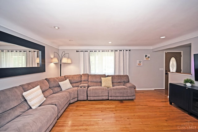 3430 Melodymanor Dr, Colerain Twp, OH 45239 - living room featuring plenty of natural light, light wood-style floors, recessed lighting, and ornamental molding