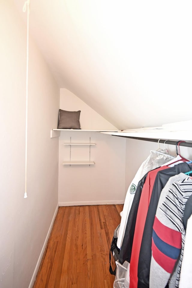 3430 Melodymanor Dr, Colerain Twp, OH 45239 - spacious closet with vaulted ceiling and wood finished floors