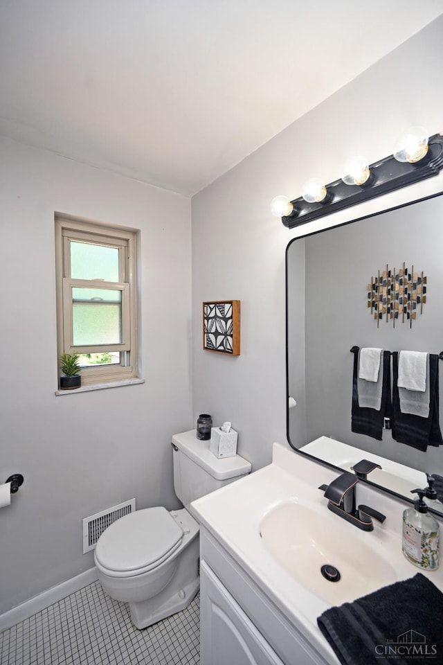 3430 Melodymanor Dr, Colerain Twp, OH 45239 - half bathroom with vanity and tile patterned flooring