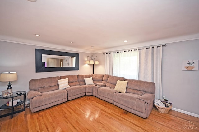 3430 Melodymanor Dr, Colerain Twp, OH 45239 - living area featuring light wood-type flooring and crown molding
