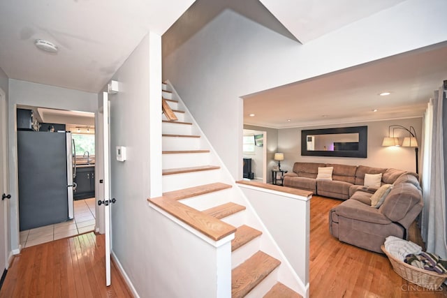 3430 Melodymanor Dr, Colerain Twp, OH 45239 - stairway featuring hardwood / wood-style flooring and baseboards