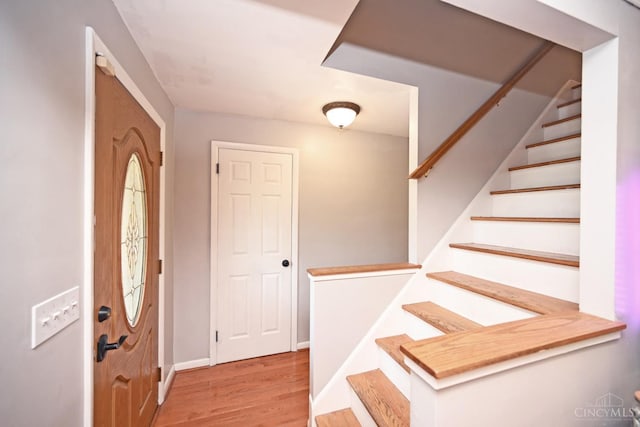 3430 Melodymanor Dr, Colerain Twp, OH 45239 - entrance foyer featuring wood finished floors and stairs