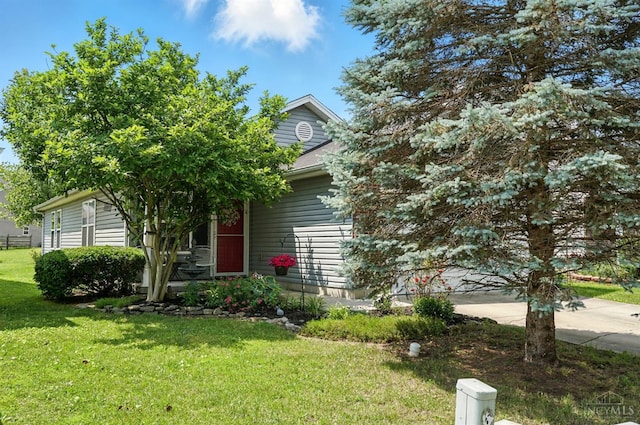 5711 Clemens Dr, Goshen Twp, OH 45140 - obstructed view of property with a front yard and concrete driveway