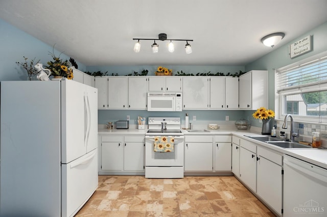 5711 Clemens Dr, Goshen Twp, OH 45140 - kitchen with white appliances, a sink, light countertops, and white cabinetry