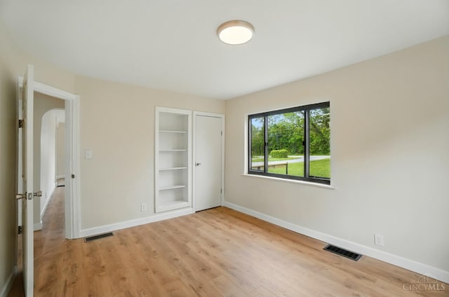 3779 Hopper Hill Rd, Pierce Twp, OH 45255 - unfurnished bedroom with baseboards, light wood-style floors, and a closet