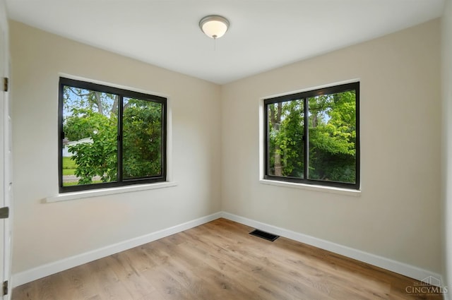 3779 Hopper Hill Rd, Pierce Twp, OH 45255 - unfurnished room with healthy amount of natural light, baseboards, and wood finished floors