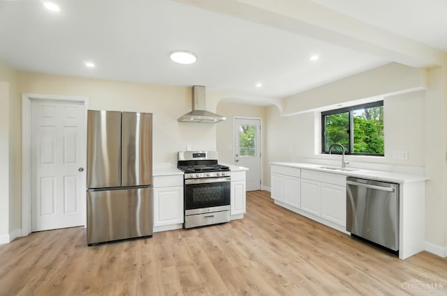 3779 Hopper Hill Rd, Pierce Twp, OH 45255 - kitchen with appliances with stainless steel finishes, wall chimney exhaust hood, a sink, light countertops, and white cabinets