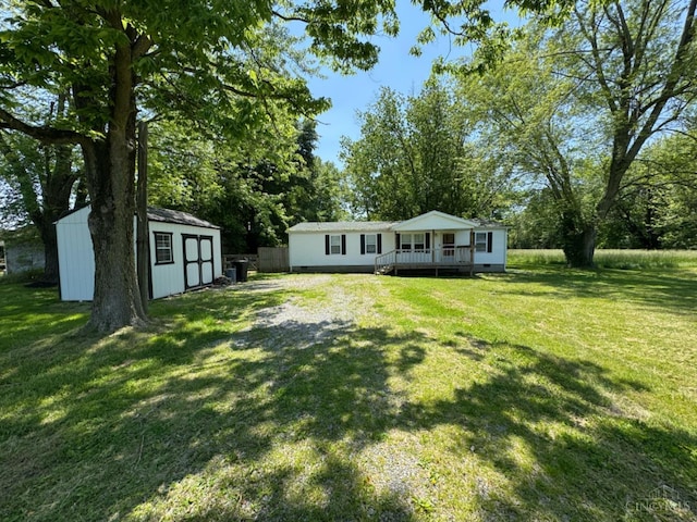 46 Frazier Rd, Jefferson Twp, OH 45148 - back of property with a lawn and a deck