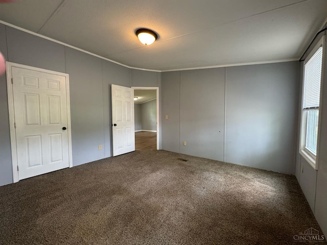 46 Frazier Rd, Jefferson Twp, OH 45148 - unfurnished bedroom with crown molding, multiple windows, and carpet