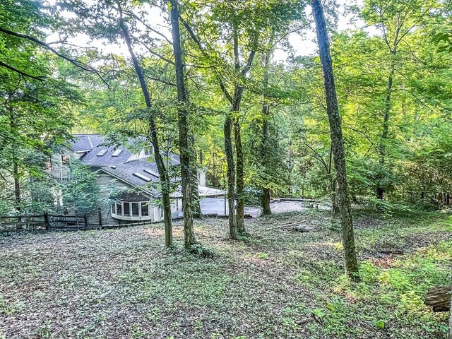 1588 Moon Valley Ln, Anderson Twp, OH 45230 - view of yard featuring a view of trees