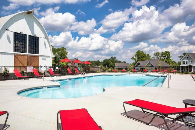 2645 Autumn Harvest Dr, Deerfield Twp, OH 45140 - community pool featuring a patio