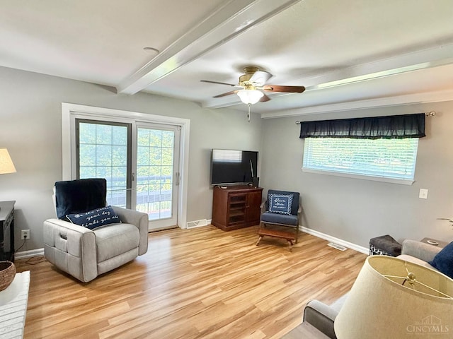 4375 Airycrest Ln, Cincinnati, OH 45211 - living area with light wood-type flooring, beam ceiling, and a ceiling fan