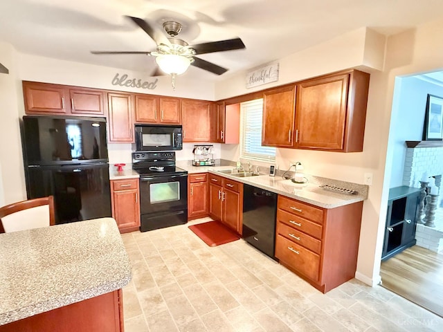 4375 Airycrest Ln, Cincinnati, OH 45211 - kitchen featuring black appliances, light countertops, a ceiling fan, and brown cabinetry