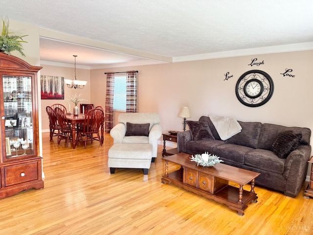 4375 Airycrest Ln, Cincinnati, OH 45211 - living area with light wood-type flooring, a chandelier, and ornamental molding