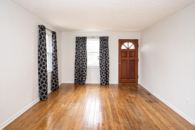 6643 Epworth Rd, Miami Twp, OH 45140 - entrance foyer with hardwood / wood-style flooring and a textured ceiling