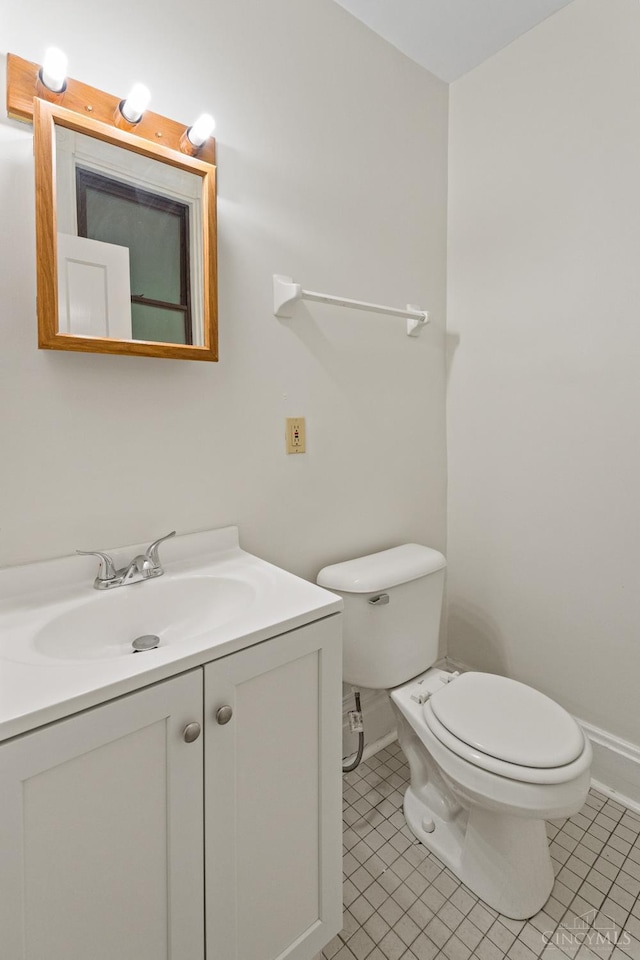 2266 Loth St, Cincinnati, OH 45219 - half bath featuring vanity and tile patterned flooring