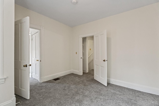 2266 Loth St, Cincinnati, OH 45219 - carpeted empty room with baseboards and a smoke detector