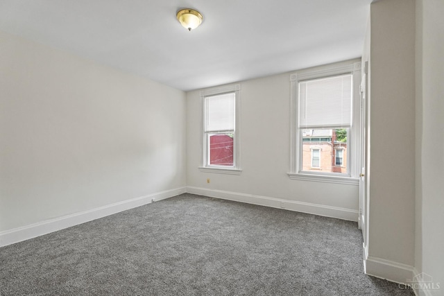 2266 Loth St, Cincinnati, OH 45219 - carpeted empty room with plenty of natural light