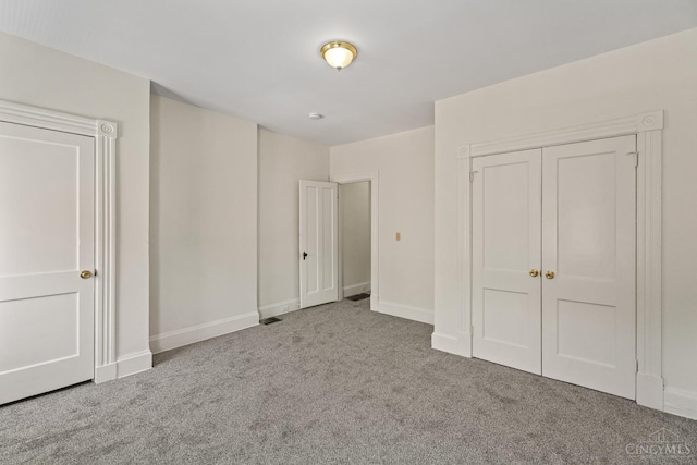 2266 Loth St, Cincinnati, OH 45219 - unfurnished bedroom with carpet floors and a closet