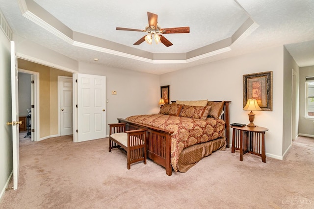 5200 Poets Way, Liberty Twp, OH 45011 - bedroom with light colored carpet, a raised ceiling, and a ceiling fan